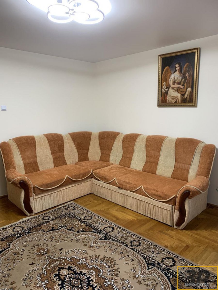 Кутовий розкладний диван теракотовий